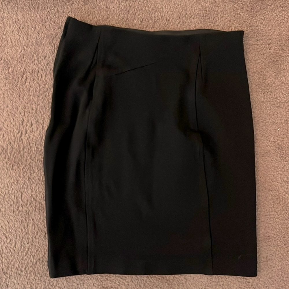 Anne Taylor Petite size 6P black pencil skirt with an elastic waist band.